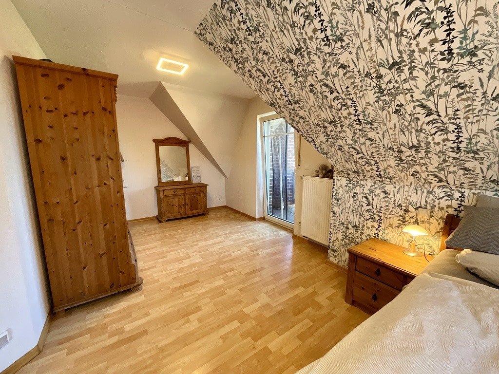 Elternschlafzimmer mit Zugang zum Balkon
