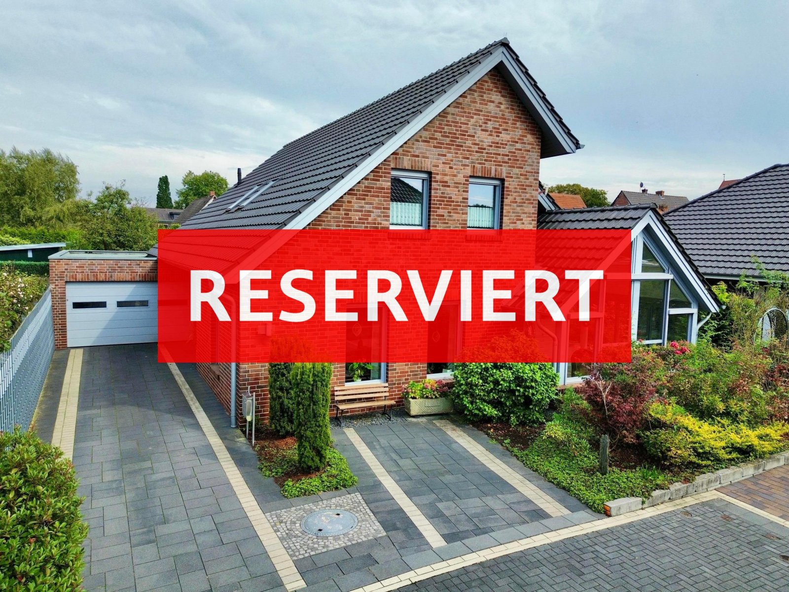 Neuenhaus: Modernes Einfamilienhaus mit Wintergarten - großzügiges Wohnen  