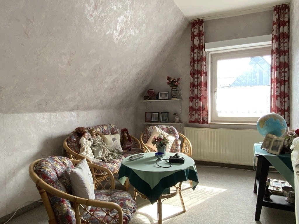 Zimmer im Dachgeschoss Zimmer im Dachgeschoss