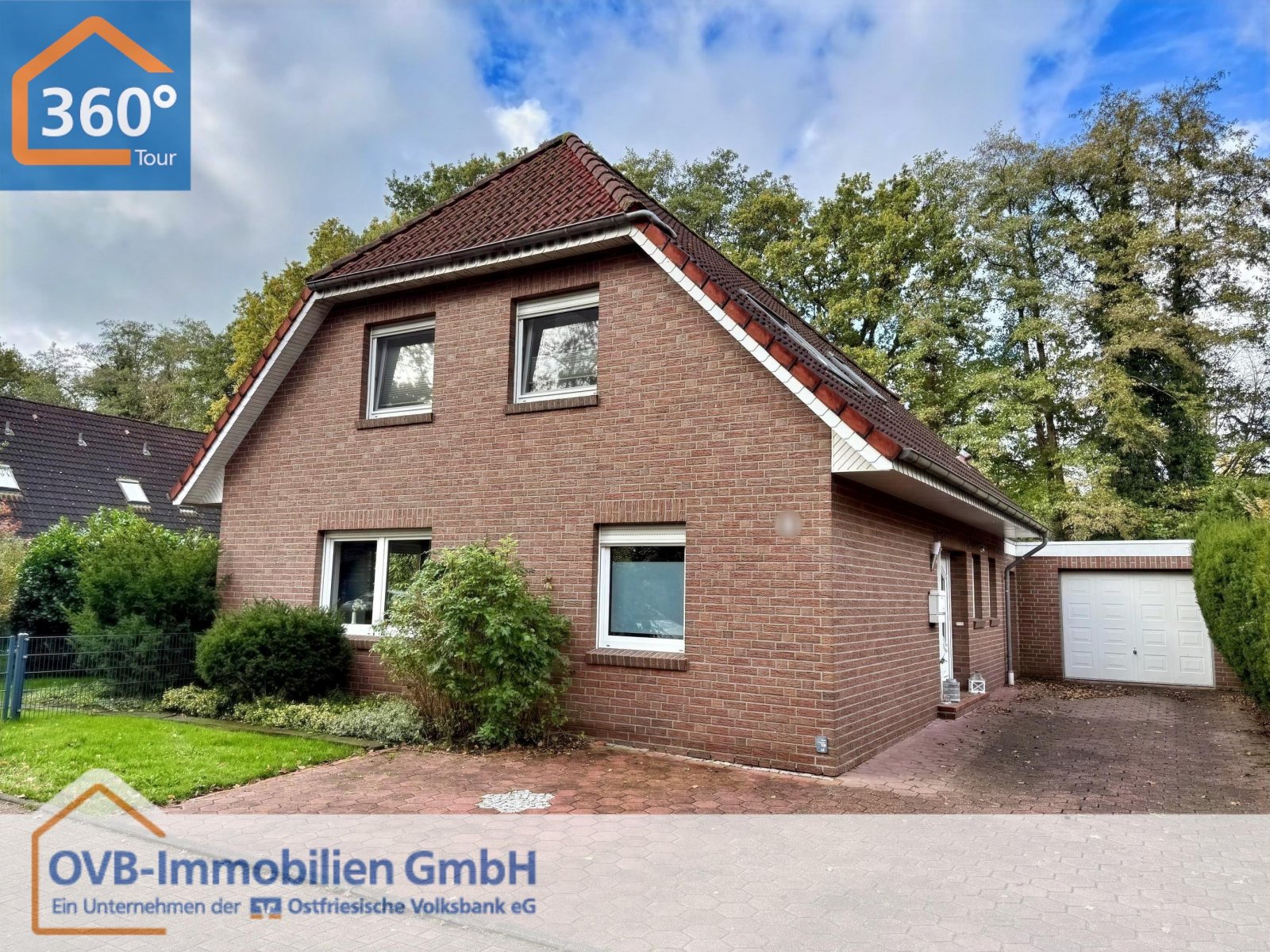 Nortmoor: Einfamilienhaus mit Garage 