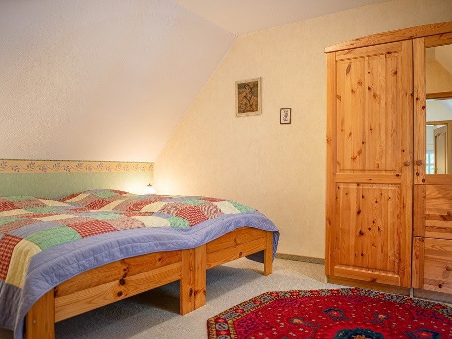 Schlafzimmer im Dachgeschoss Schlafzimmer im Dachgeschoss