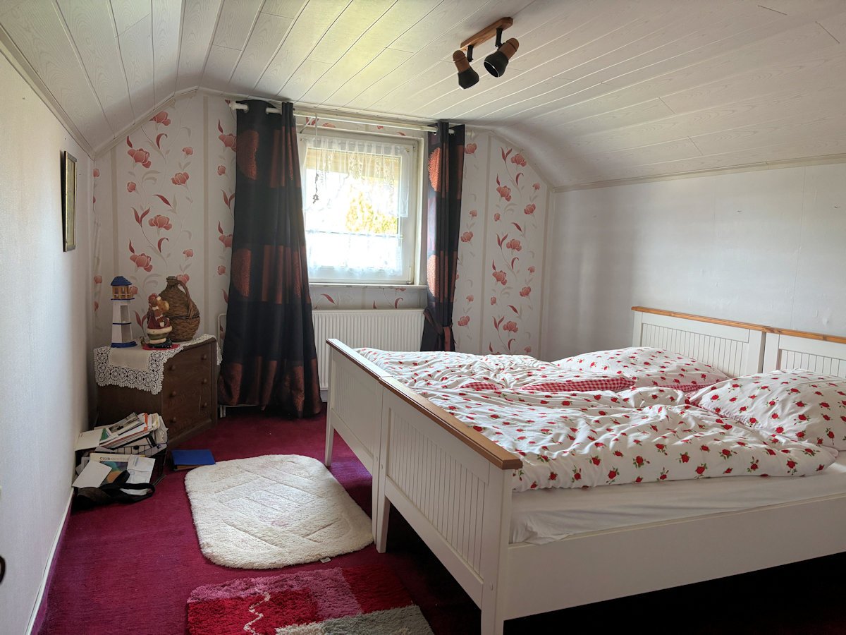 Schlafzimmer im Dachgeschoss Schlafzimmer im Dachgeschoss