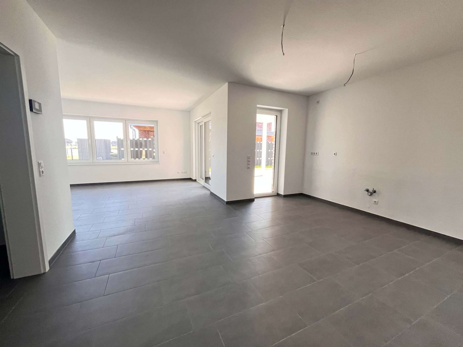 Wohnzimmer mit Küche