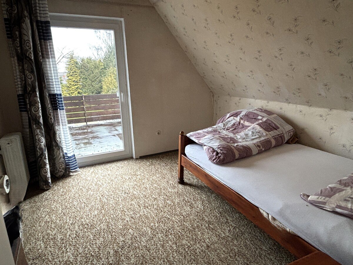 Zimmer im Dachgeschoss mit Zuwegung zur Dachterrasse