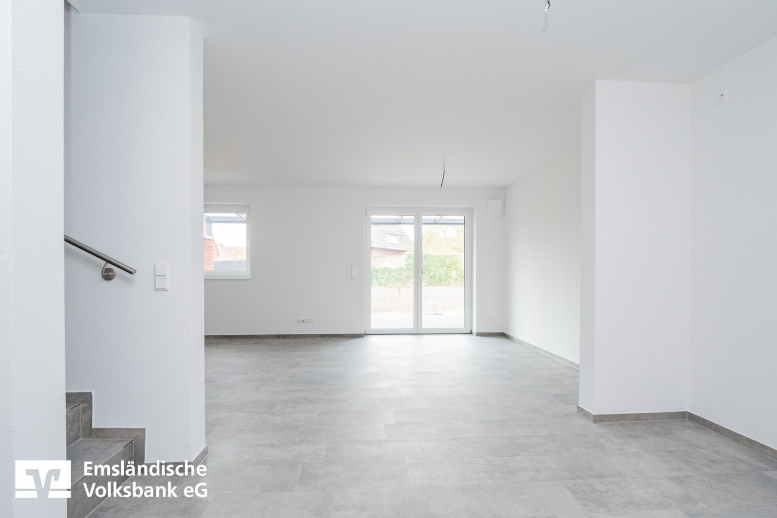 Wohn- und Esszimmer mit offener Küche