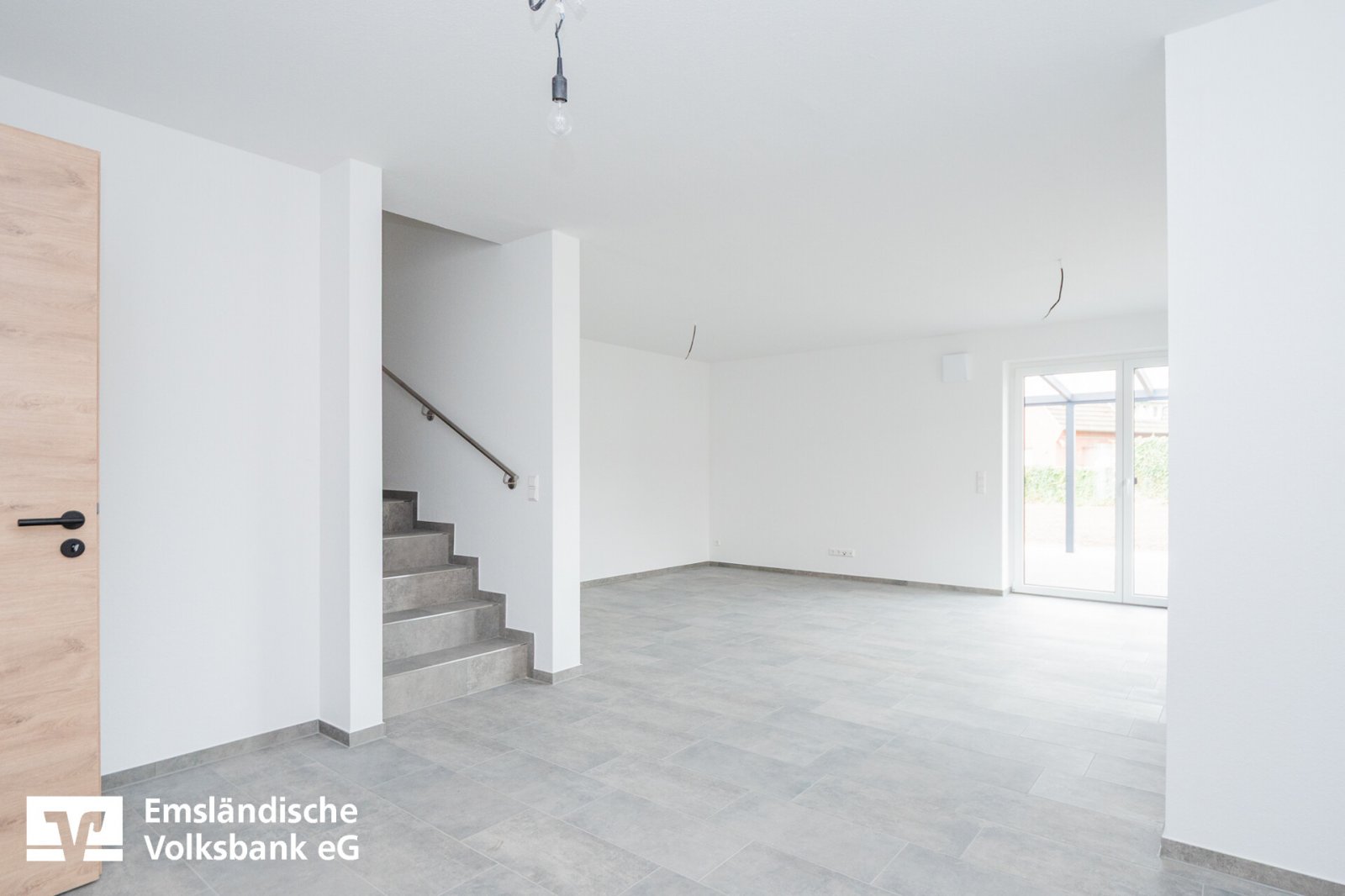 Wohn- und Esszimmer mit offener Küche