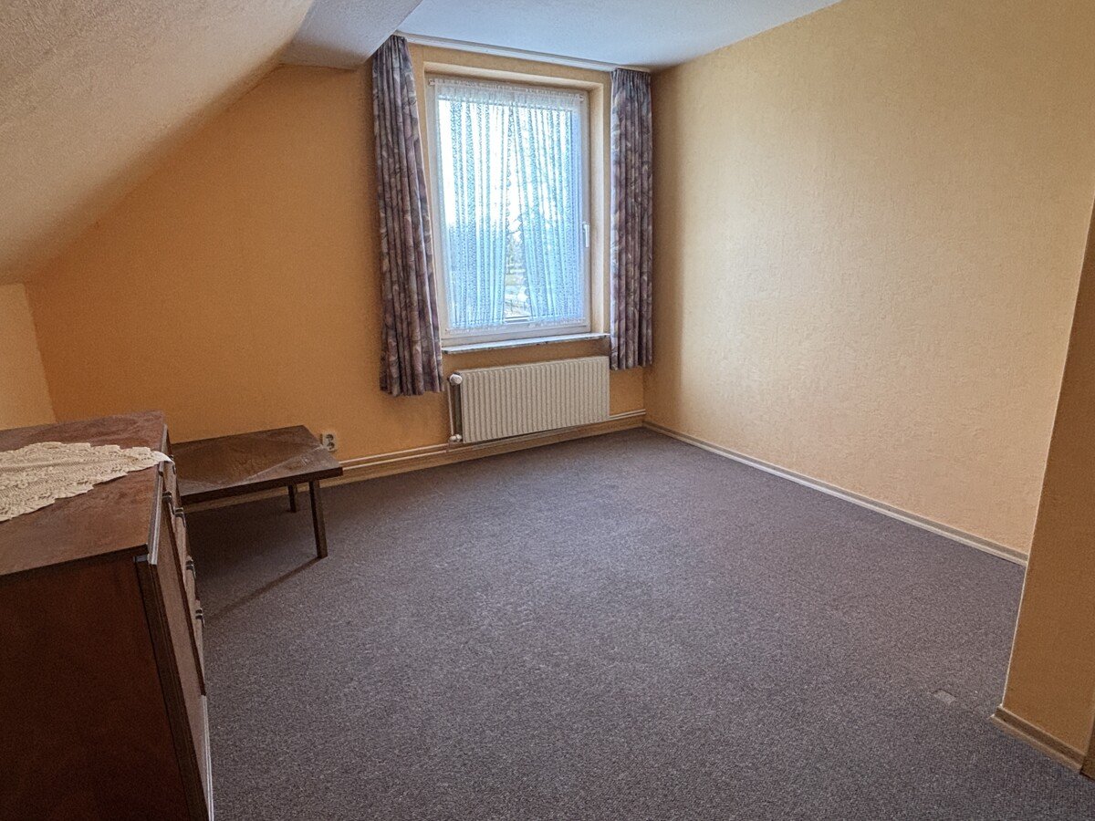 Zimmer I im Dachgeschoss Zimmer I im Dachgeschoss