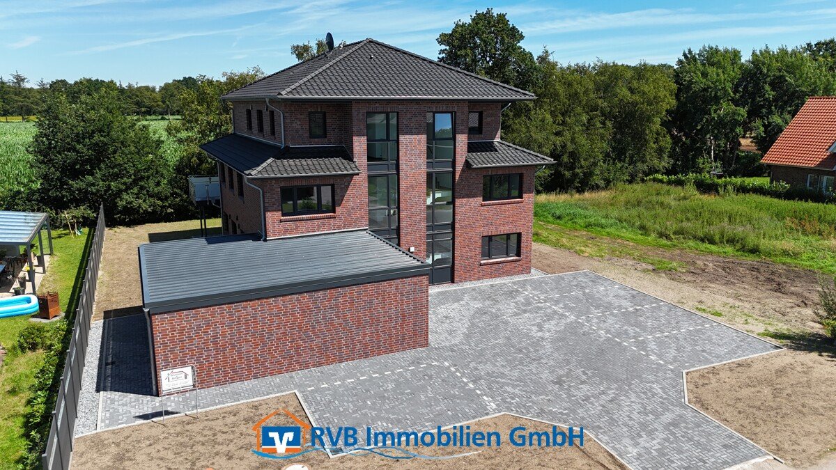 Apen: Sonnige Erdgeschosswohnung in zentraler Wohnlage 