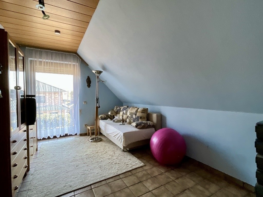 Zimmer im Dachgeschoss Zimmer im Dachgeschoss