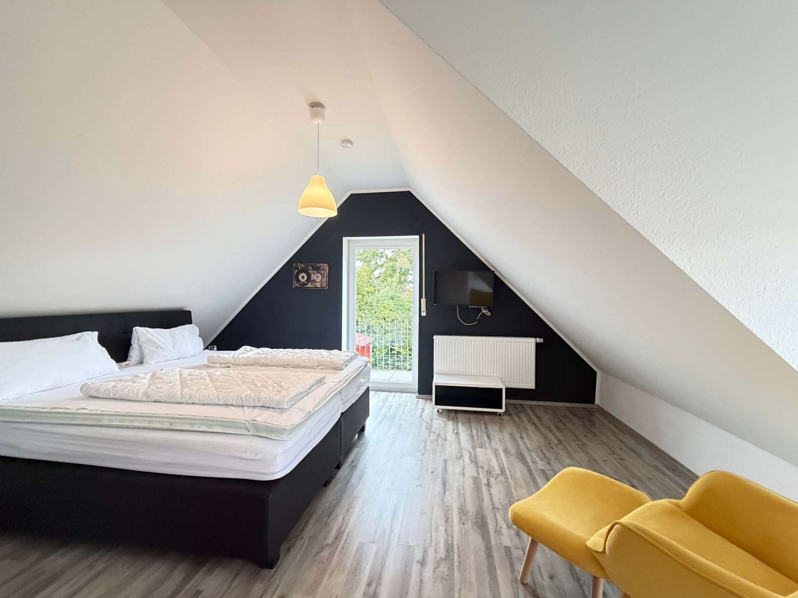 Schlafzimmer mit Balkon